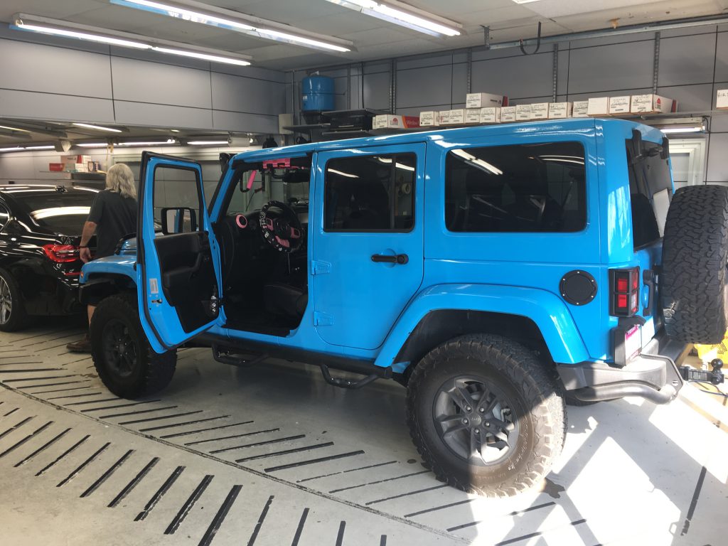 Blue Jeep Window tinting installation